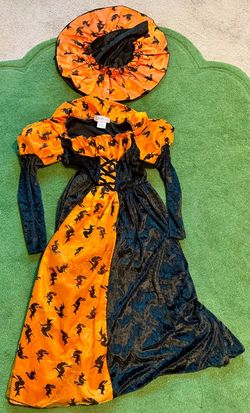 Fancy witch with a hoop skirt