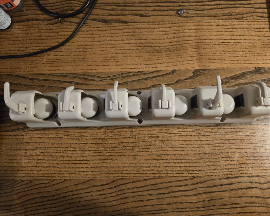 Wall Rack For Mops + Brooms