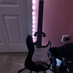 Squier Stratocaster Electric Guitar w Amp & Stand