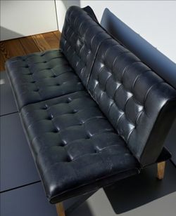 Black Faux Leather Tufted Futon Sofa