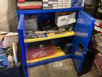 Heavy Duty double door steel cabinet.