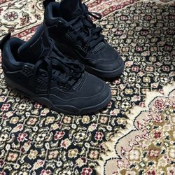 Black Cat Jordan 4s 