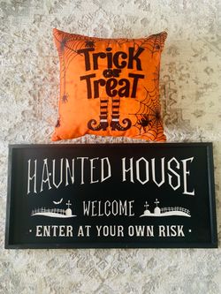 Haunted house Halloween Sign $25 and trick-or-treat light up pillow $20