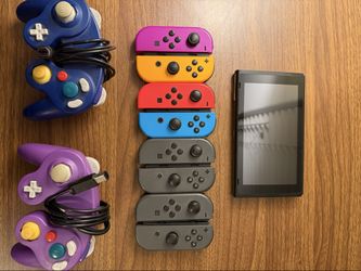 Nintendo Switch Bundle - Console + 8 Joy-Cons + 8 Games + Extras