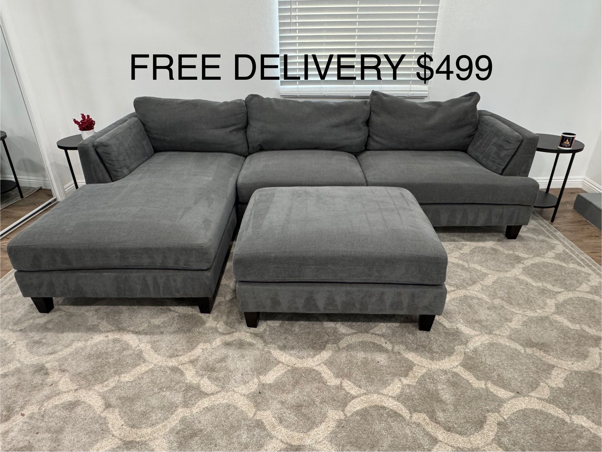 FREE DELIVERY - Grey Living Spaces Sectional With Ottoman
