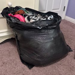 Big bag of Xs-small clothes