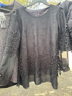 Women’s dressy top size XXL runs like a XL