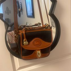 Dooney & Bourne.  All Weather  Leather