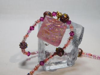 Hand made fused dichroic glass cabochon on beaded necklace.