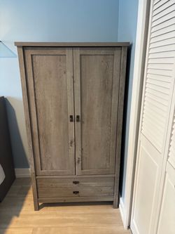Grey  armoire.