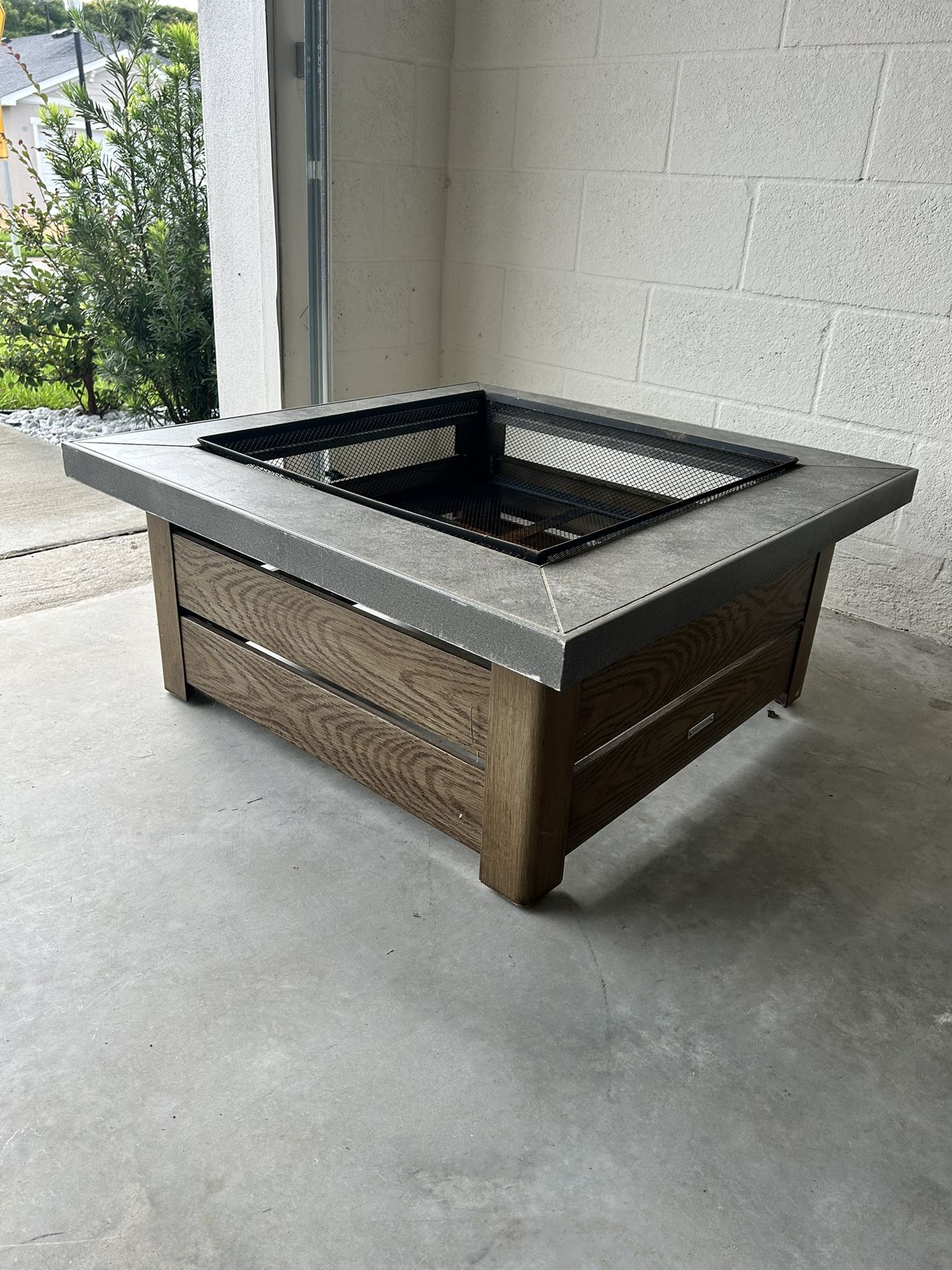 Fire pit. Stone and wood.