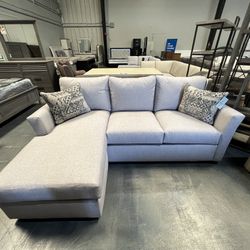 Grey Sectional w/ reversible chaise 