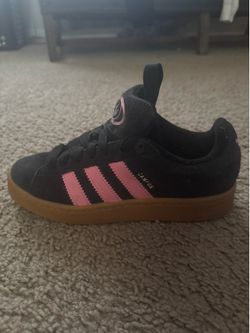 Black and pink Adidas Campus sneakers