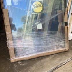 New Pella fixed window , brown exterior , 47 1/2 by 47 1/2