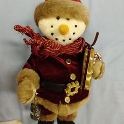 

Rhythmical Snowman Doll, animated, 14” high x 7” high, battery operated dances and sings--
