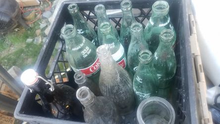 Coke and other antique bottles