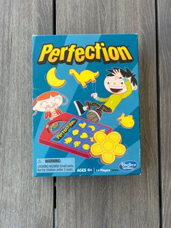 Perfection game by Hasbro Gaming. Ages 4+
