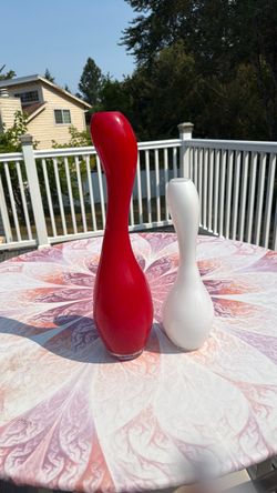 red and white Torre & Tagus decorating vases
