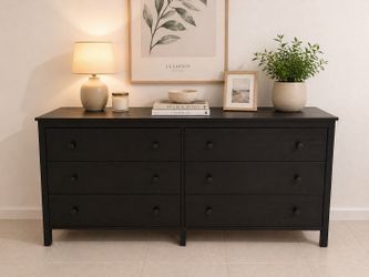 Black modern chest of drawers in excellent condition.