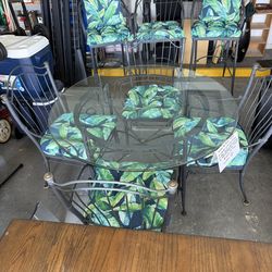 Beautiful Glass Top patio Set With 4 Chairs and 3bar Stools.
