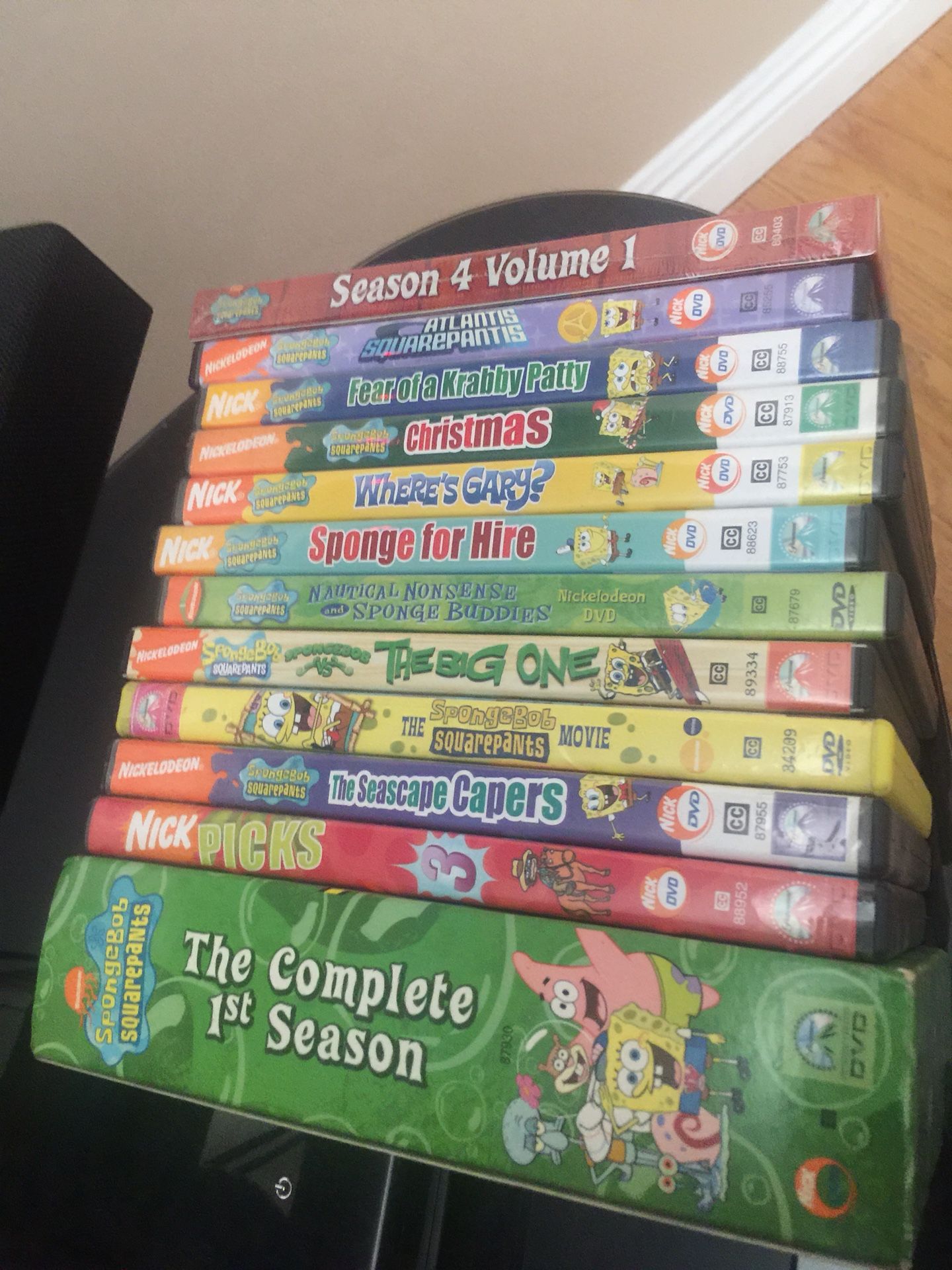 12 Spongebob Squarepants dvds including season 4 volume 1 and the complete 1st season