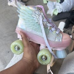 Girls size 1 us roller skates Skechers
