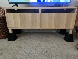 Light Oak TV Stand with Cabinet Doors. PICK UP ONLY