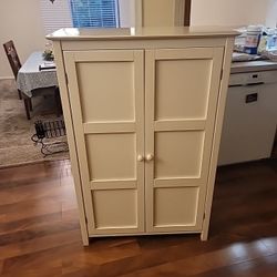 SOLD 😃 SOLD. White 2 Door Storage / Pantry Cabinet