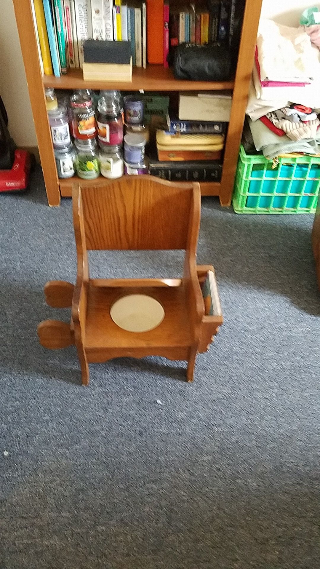 Antique potty chair w/ book holder an toilet roll holder . $50.00