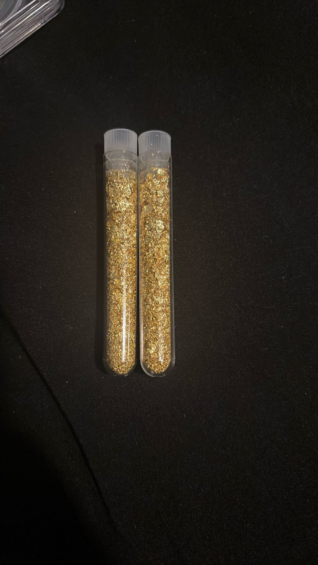 Two Capsules Of Gold Flakes,