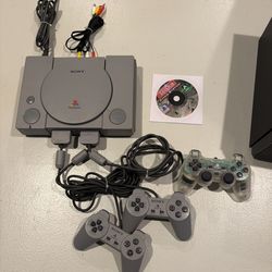 Sony PlayStation game console bundle  gray w/ 3 controllers one game + vintage storage container
