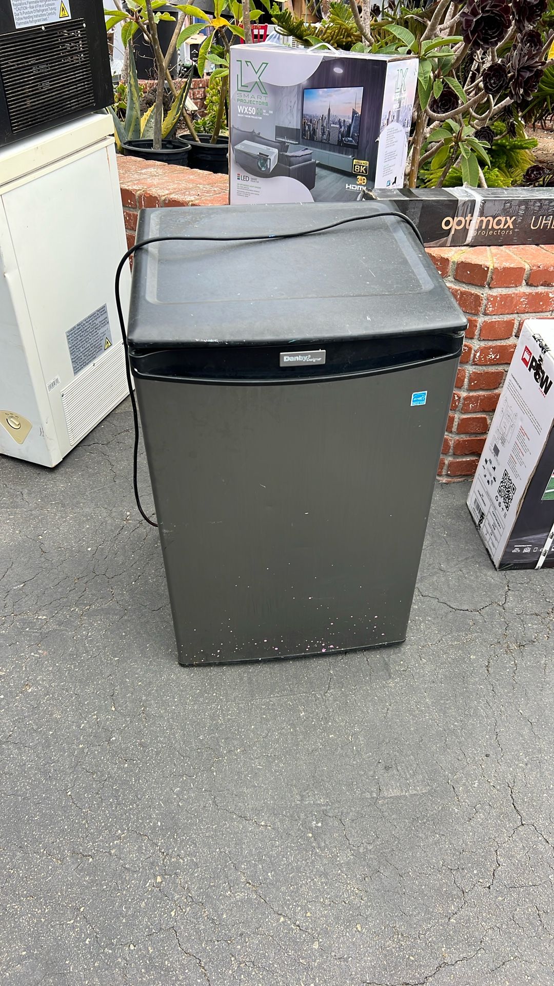 Perfect mini fridge for a garage or man cave.