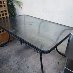 Outside table with glass top