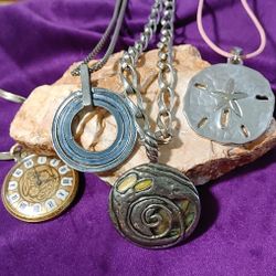 Collection of 4 Unique pendants