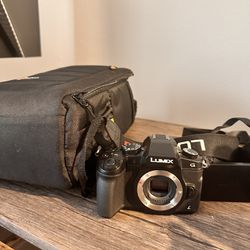 Panasonic LUMIX Dmc G85 W/ Extra Lense, Tripod And Bag 
