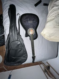 colombian guitar comes with two cases