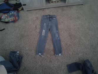 Wax jeans skinny jeans with design rips size is 12-18 M