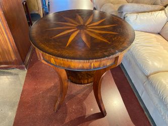 Round Table with Starburst Inlay Pattern