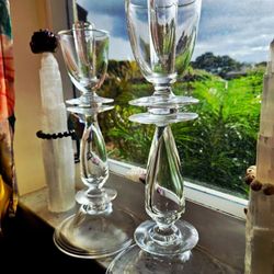 Pair of 20th-century Steuben Crystal Double Disk Candlesticks, designed by Donald Pollard in 1955. Modernist double disk design with a teardrop shape.