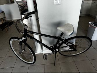 This is a project for you to finish; it is missing the chain and a few other details. The frame is aluminum, and it has good tires.