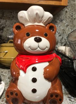 Vintage ceramic bear shaped B & D cookie jar. Made in Japan. It measures about 12” x 6”.