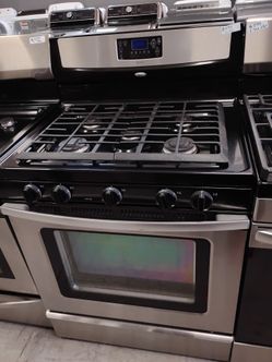 Gas stainless five burners everything works with warranty delivery Available fee depends on address