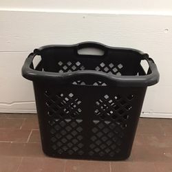 Large plastic black laundry basket in good condition 