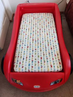 Kid's car bed with baseboard and mattress