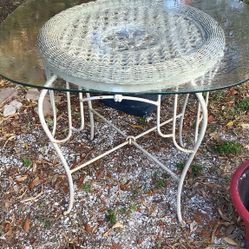 Vintage metal and wicker patio Table