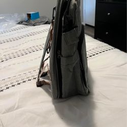 Diaper Bag Converts Into Changing Table 