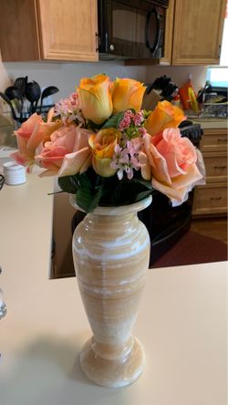 Heavy vase with lovely faux flowers