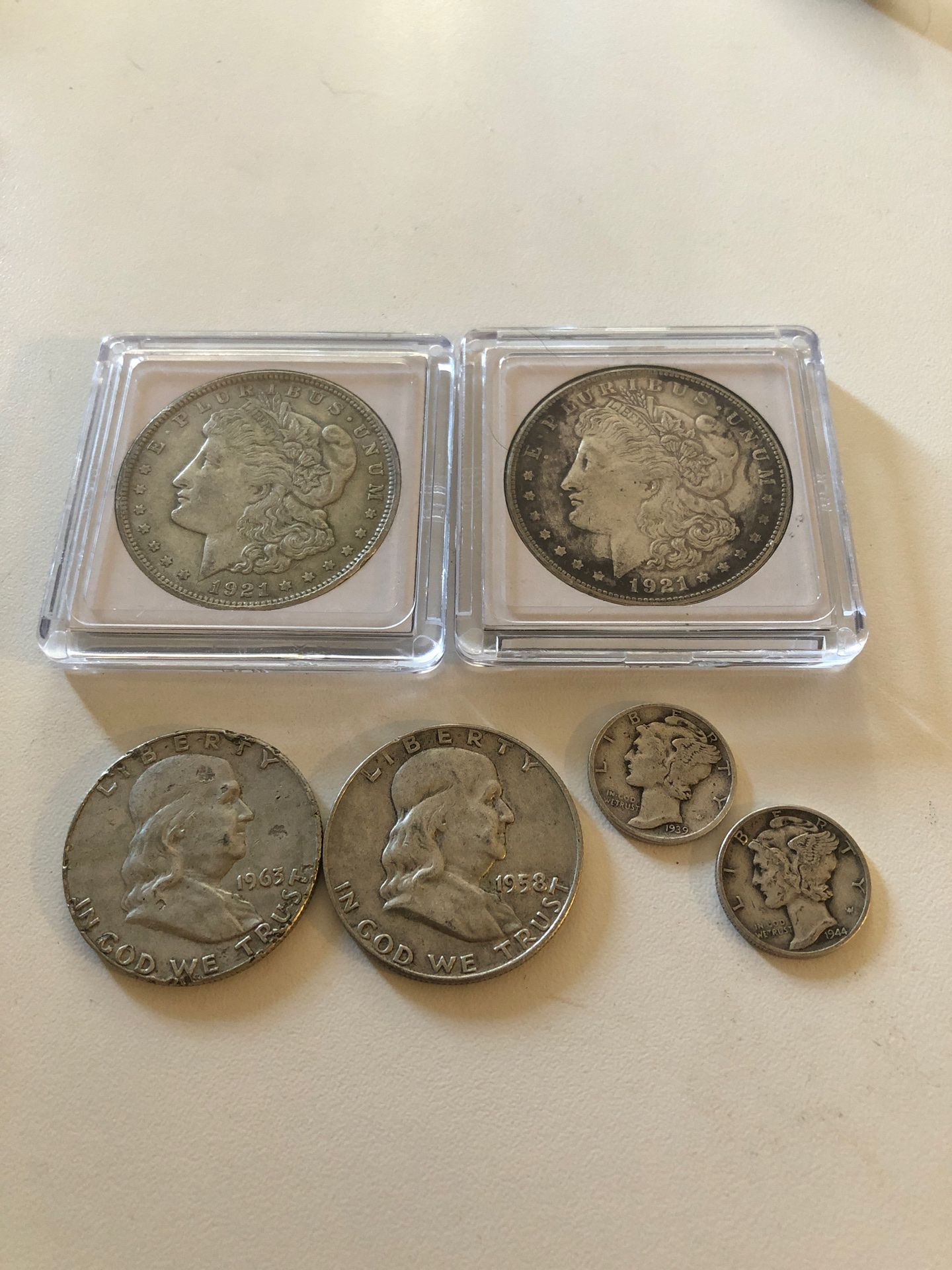 Morgan silver dollar, Franklin half dollar, mercury dimes