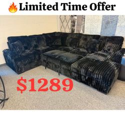 Black Right Facing Chaise Storage Corduroy Fabric Upholstered U-Shaped Sectional Sofa with Pull Out Bed and 6 Throw Pillows.