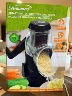 Cheese grater shredder and slicer